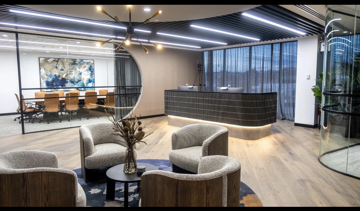 Contemporary commercial reception area and conference room completed by Delmic Commercial Interiors